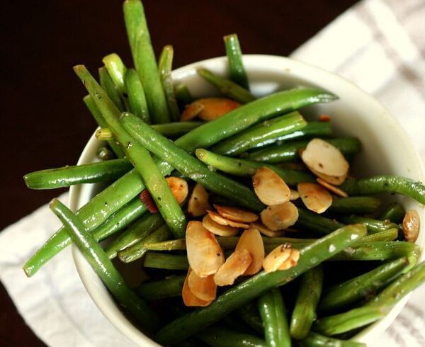 green beans in bowl with sliced almonds